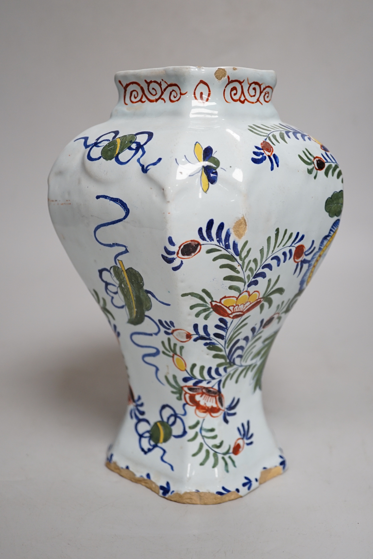 An 18th century Delft polychrome vase, 24cm high